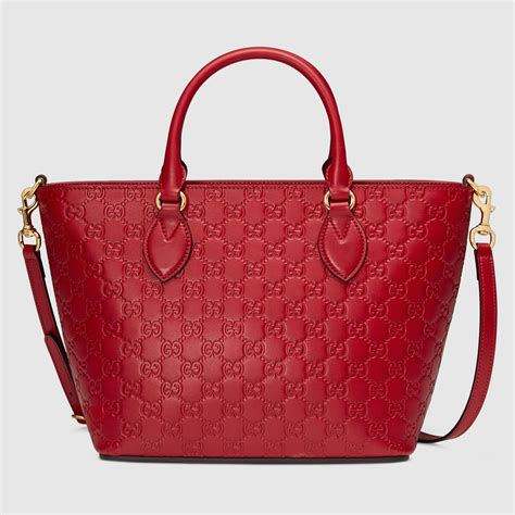 was gucci built on leather|Gucci leather tote bag.